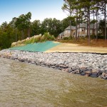 Slope stabilization with riprap and hydroseeding, private residence