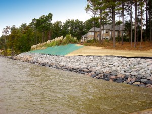 Slope stabilization with riprap and hydroseeding, private residence