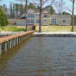 Completed beach creation/beach nourishment project with riprap erosion control. Private residence, Chickahominy River, Virginia.