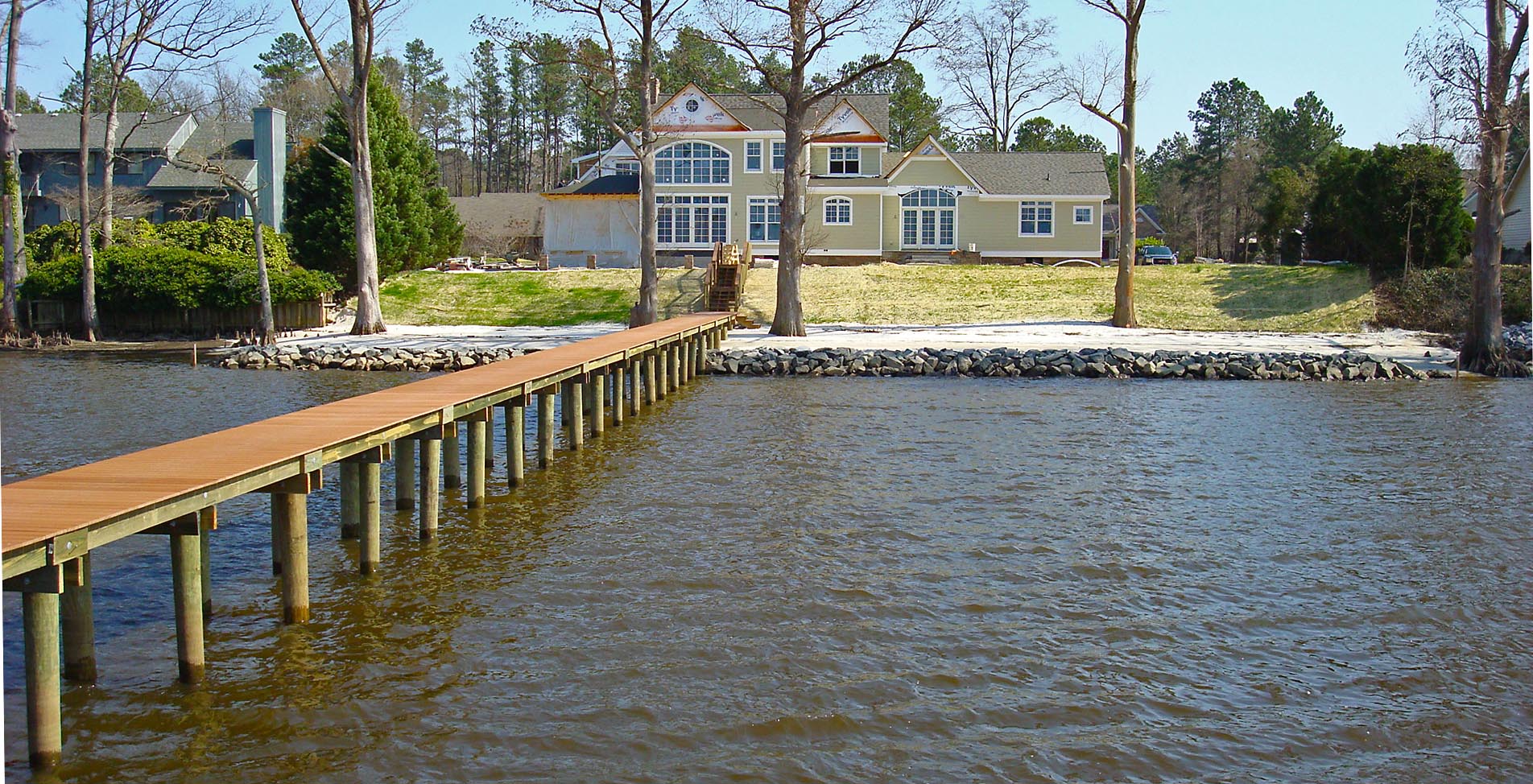 Completed beach creation/beach nourishment project with riprap erosion control.  Private residence, Chickahominy River, Virginia.